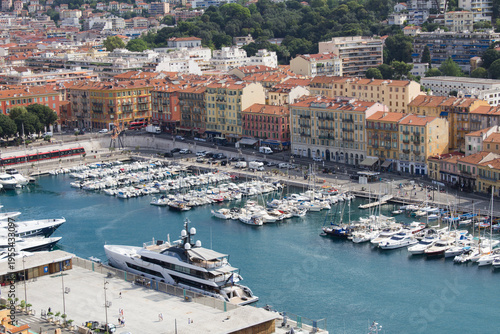 Fotografie Top view of the white yachts in the seaport and city on a summer day