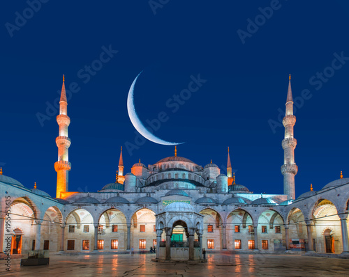 Ramadan kareem concept - The Sultanahmet Mosque (Blue Mosque) with crescent moon - Istanbul, Turkey