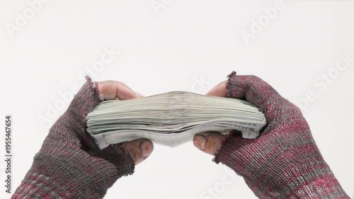 Homeless hands holding US dollar banknotes on white background, closeup