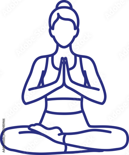A woman sitting in a meditative yoga pose with hands clasped together