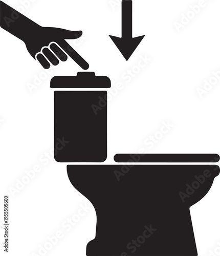 A hand dropping a toilet brush into a toilet