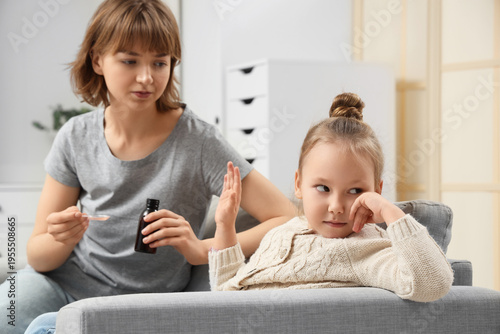 Ill little girl refusing to...