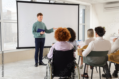 Young woman in wheelchair w...
