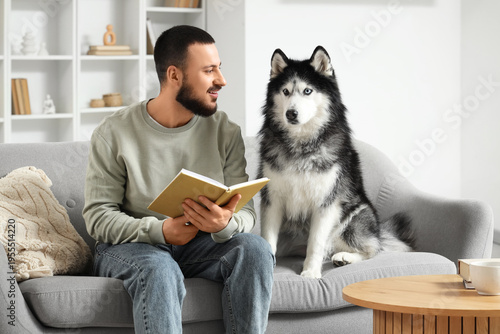 Handsome young man sitting ...