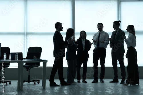 Silhouettes of business peo...