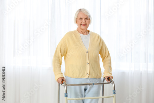 Senior woman with walker ne...