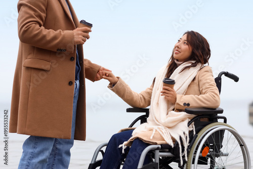 Young Asian woman in wheelc...