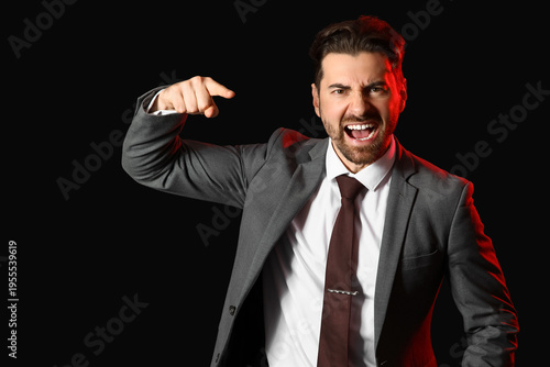 Angry businessman pointing ...