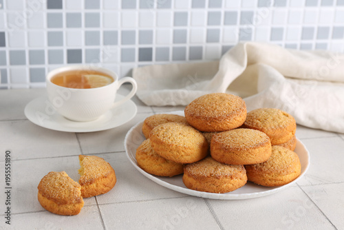 Plate with sweet cookies an...