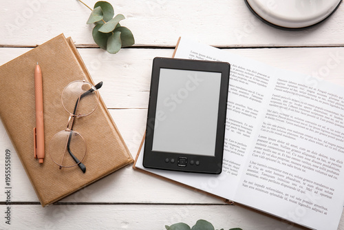 Modern e-reader with books,...
