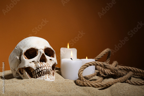 Human skull with burning ca...
