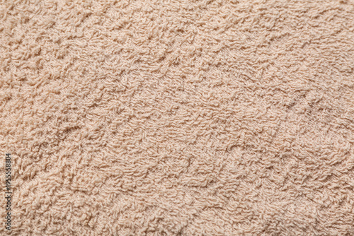 Texture of beige fluffy fab...