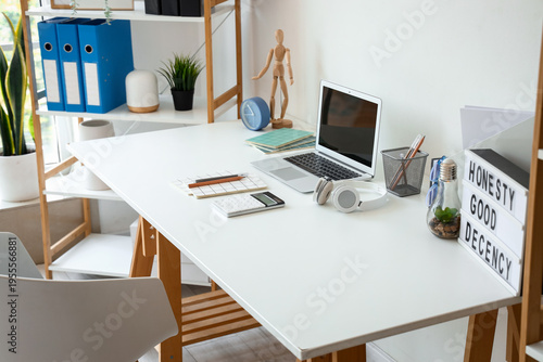 Modern workplace with lapto...