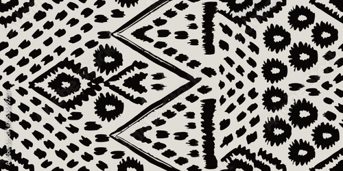 Abstract black and white geometric pattern resembling ikat or tribal art