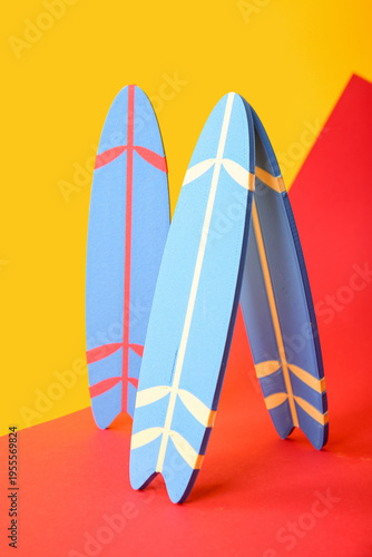 Mini surfboards on color ba...