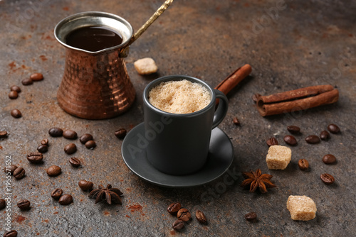 Cup and jezve of hot espres...