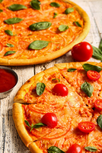 Tasty pizzas margarita on w...