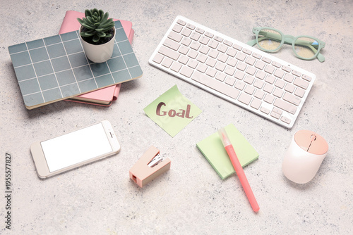 Sticky note with word GOAL,...