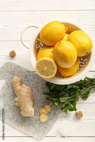 Board with lemons, mint, ic...