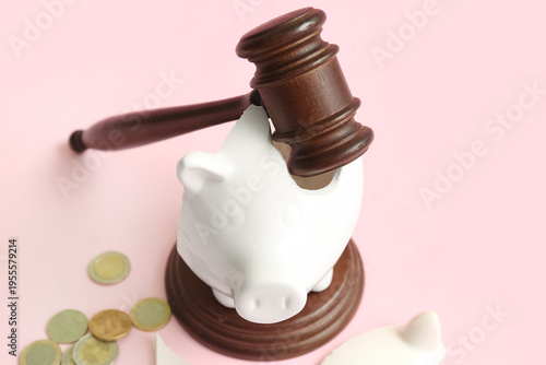 Broken piggy bank with judg...