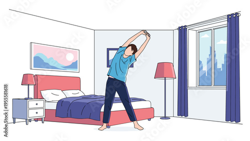 Young man wearing a blue shirt stretches his arms and body in his bright bedroom after waking up from a restful night of sleep in his bed.