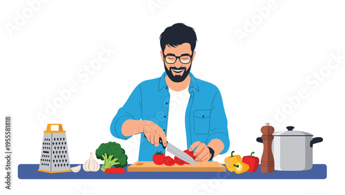 Smiling man with a beard and glasses carefully chops fresh red tomatoes on a wooden board surrounded by various vegetables.