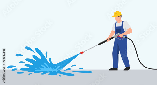 Worker pressure washing pavement with hose and blue water spray