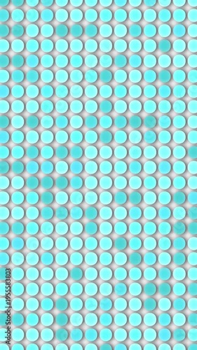 Fun patterns of colored dots moving on a screen in bright shades of blue and white during daytime