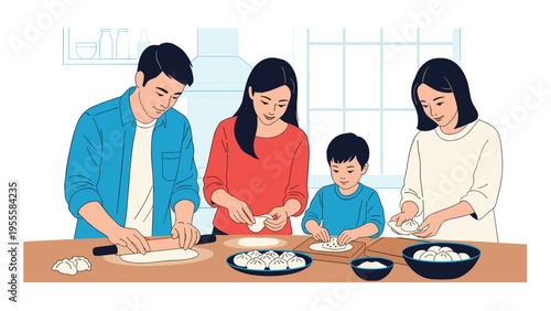 Happy Asian family consisting of parents and two children working together to prepare traditional handmade dumplings at a large kitchen table.