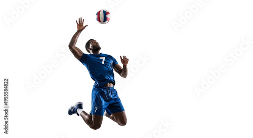 African American male volleyball player in blue uniform jumping to hit ball