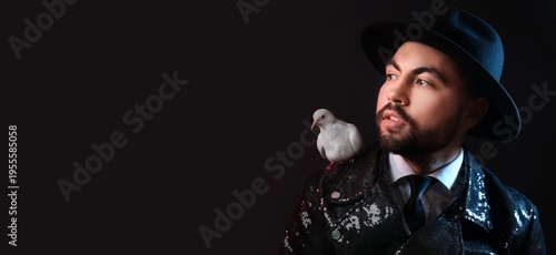 Male magician with white pi...