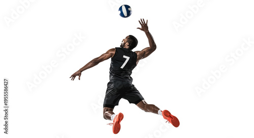 African American man in black jersey number 7 jumping to hit volleyball