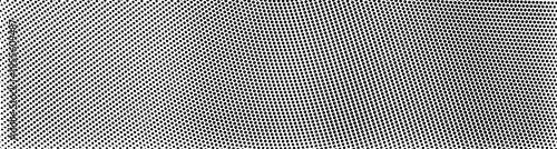 Wavy dot grid texture forming abstract optical illusion in black and white.