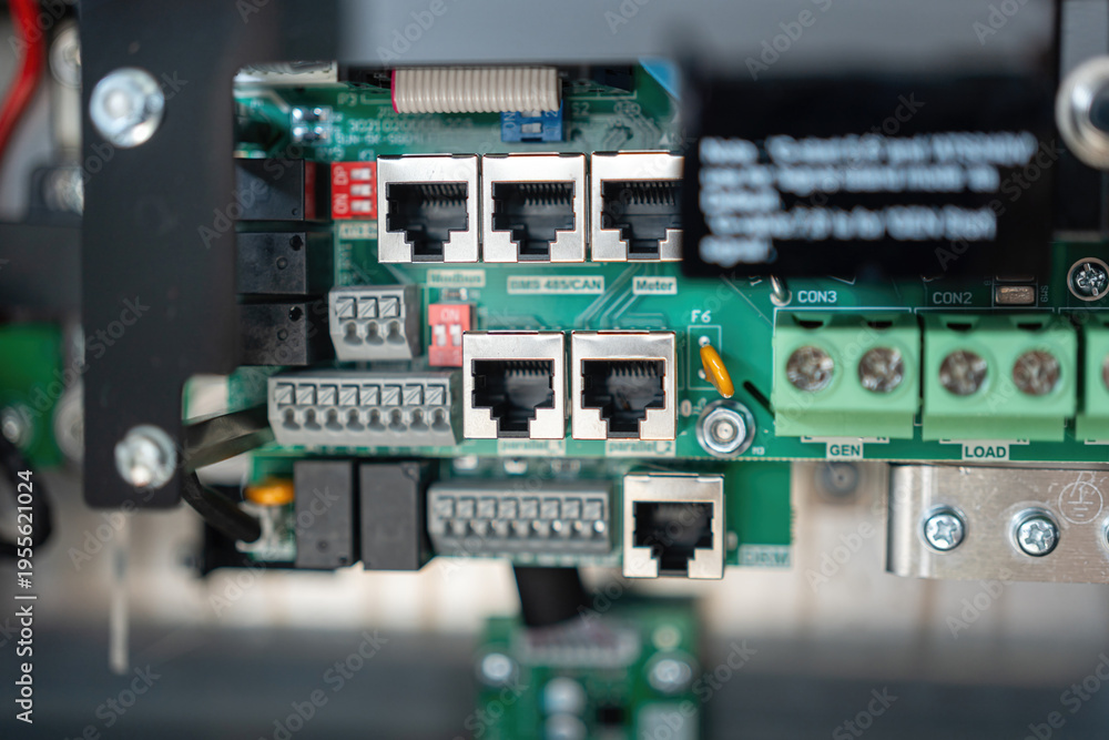 Fototapeta premium Lan connection port on the mainboard and electronic mainboard. Electrical equipmet and technology device part, close-up with selective focus.