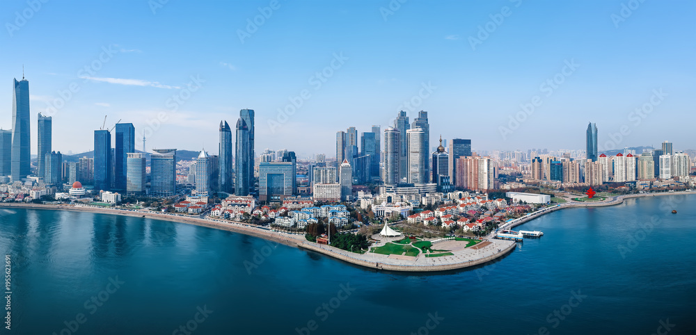 Fototapeta premium Aerial View of Modern City Skyline and Waterfront