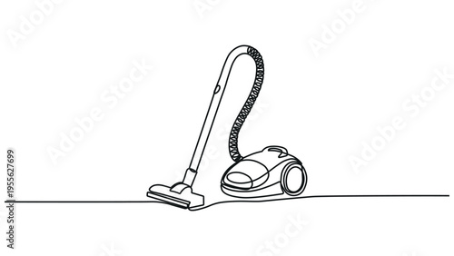 A vacuum cleaner positioned on a flat surface with an extended hose attachment