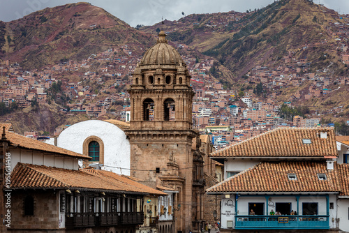 Fotografie Historic cityscape with colonial church and mountain houses