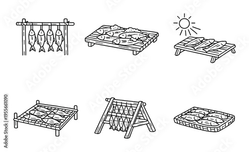 Fish drying racks and platforms arranged on dark background