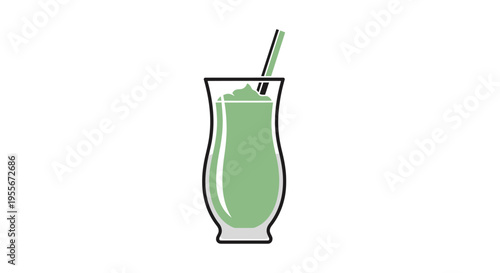 Green smoothie with straw in glass.