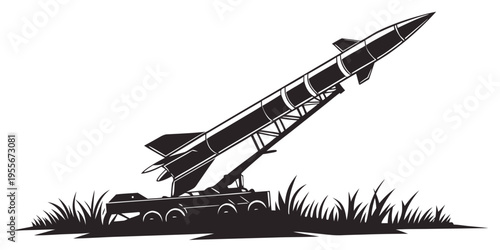A black silhouette of a missile launcher on a grassy field