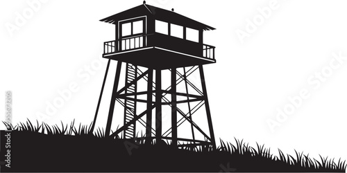 A tall tower with a small house on top