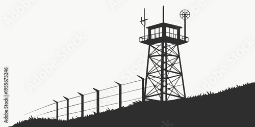 A tall metal watchtower with a fence next to it