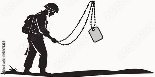 Soldier standing on a hill looking at dog tag