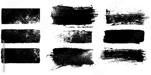 Grungy brush stroke texture set with black paint splashes. ink stains rough artistic background creative design.