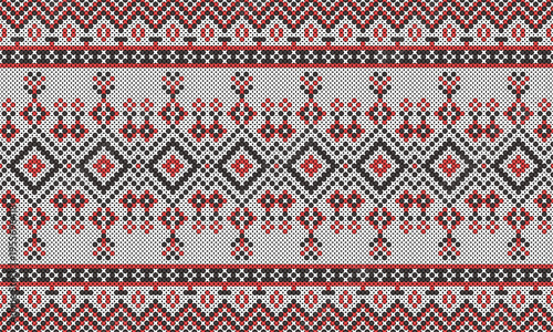 Native Indian and East Asian ethnic style cross-stitch knitted pattern in red and black stripes.