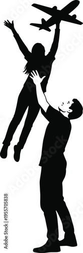 Silhouette of man lifting woman holding airplane black