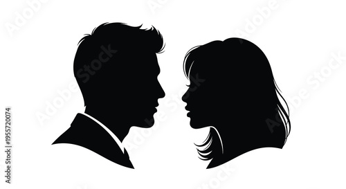 Couple facing each other in a dramatic dark silhouette