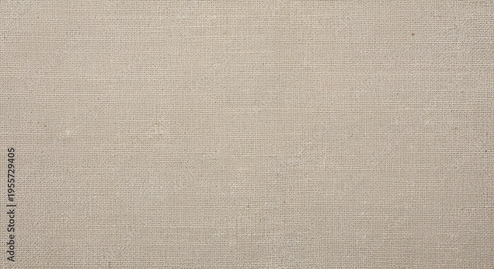 Fototapeta premium Beige woven canvas fabric texture background. Natural blank linen cloth surface for rustic textile design, seamless interior material backdrop, and plain fashion apparel pattern
