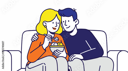 Happy Young Couple Sitting on Sofa and Sharing a Bowl of Ice Cream