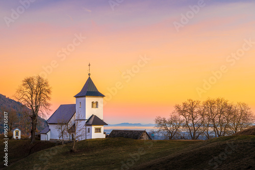 Church on the hill in the colorful sunset